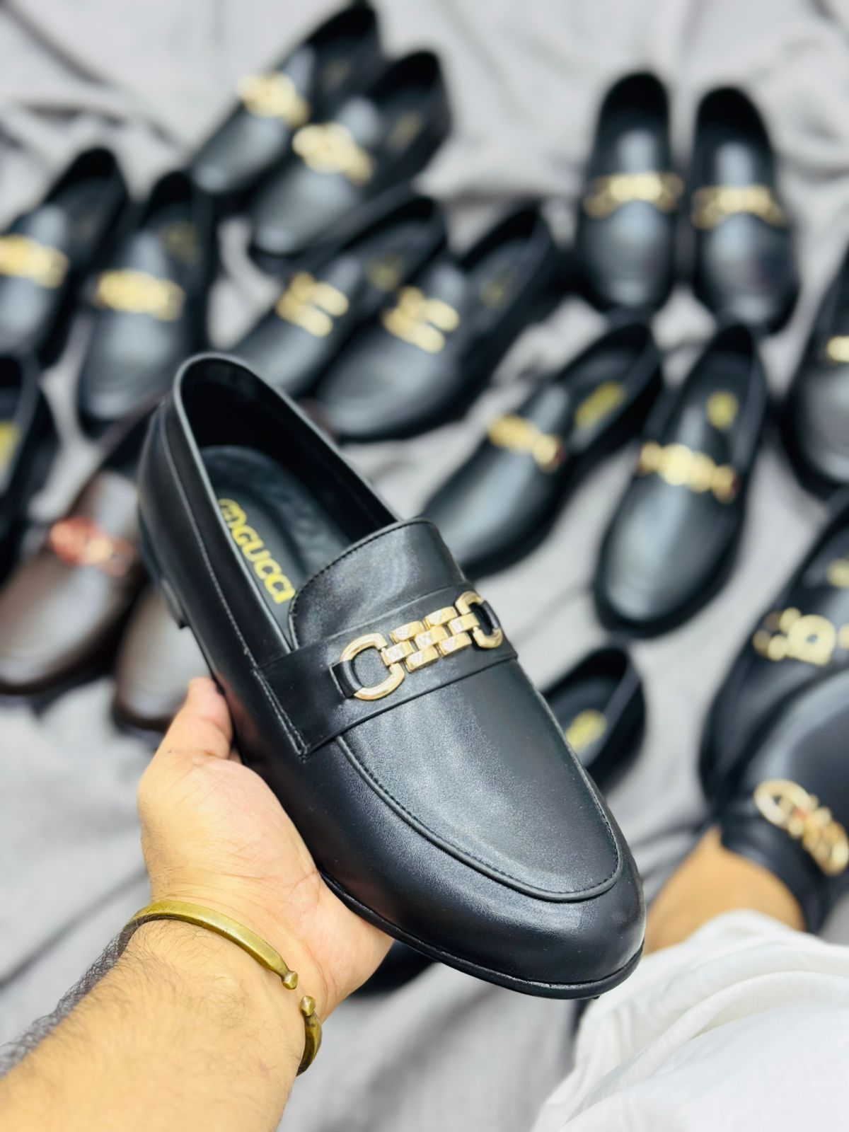 Gucci Black Leather Loafers with Gold Buckle – Premium Elegance