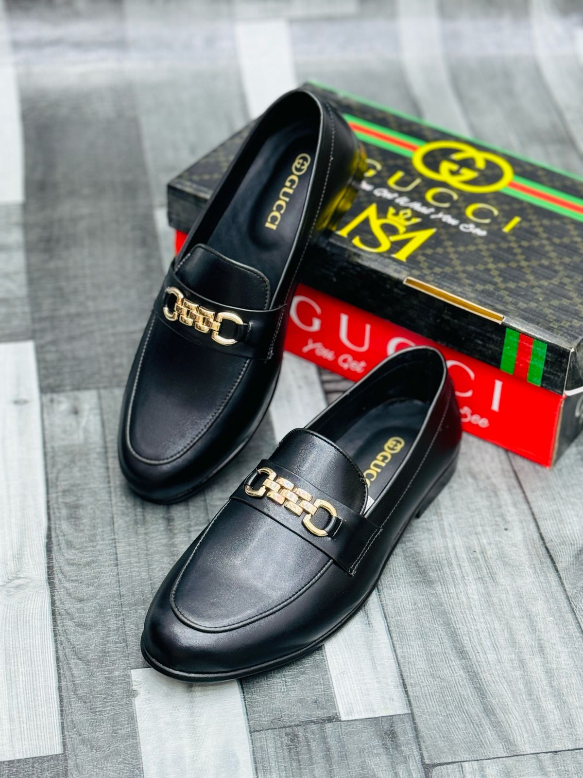 Gucci Black Leather Loafers with Gold Buckle – Premium Elegance