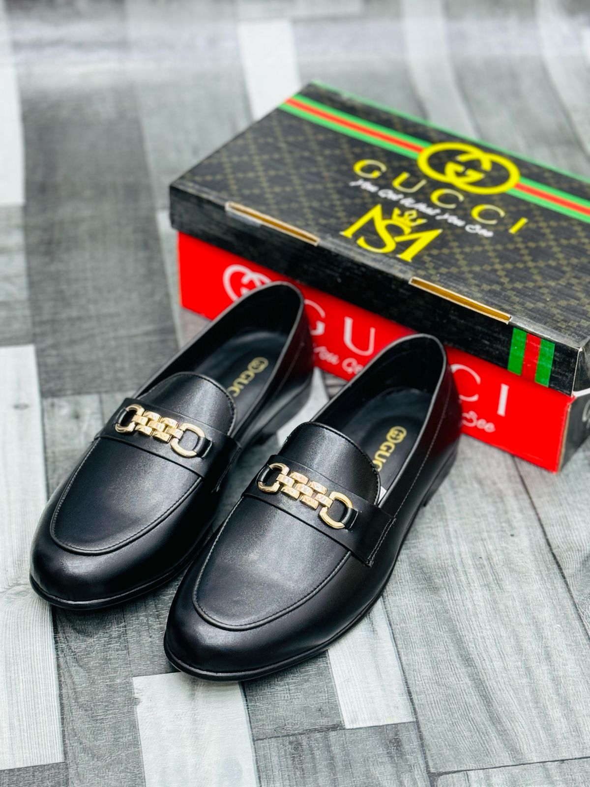 Gucci Black Leather Loafers with Gold Buckle – Premium Elegance