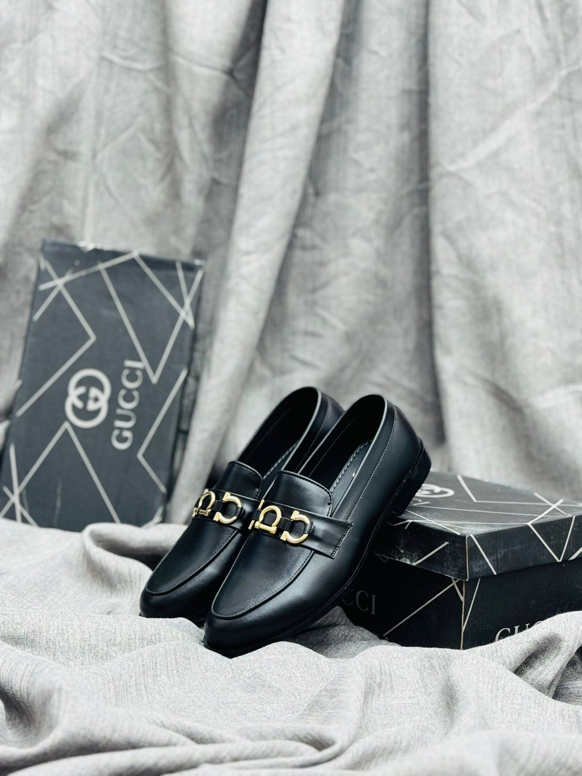 Gucci luxury Black Leather Loafers with Gold Buckle – Premium Elegance